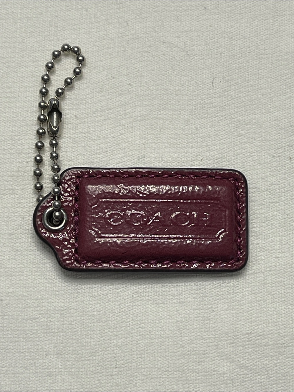 Coach Leather Hang Tag in Glossy Magenta with Ball Chain